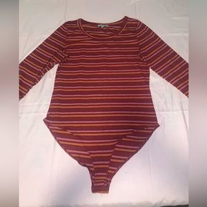 Red long sleeve bodysuit with mustard stripes